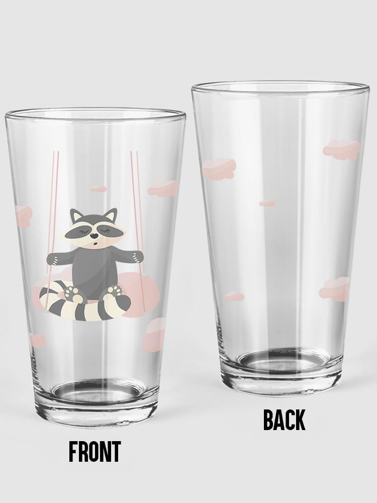 Raccoon On A Swing Pint Glass -Image by Shutterstock