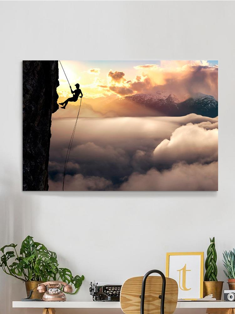 Rappelling From A Cliff Wrapped Canvas -Image by Shutterstock