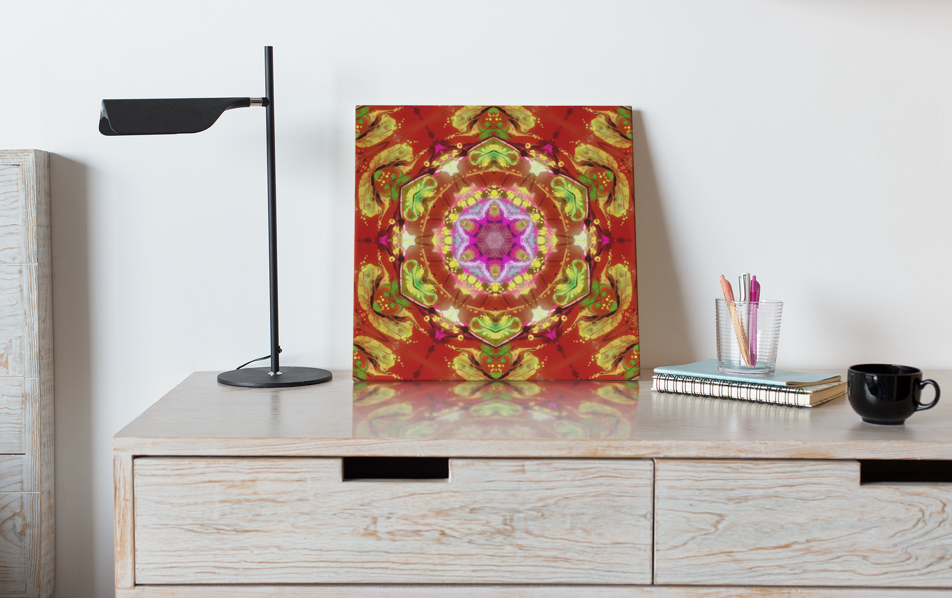 Introducing "Hypnotic Kaleidoscope" by Alejandro Gordillo. Wrapped Canvas on a bed side table.