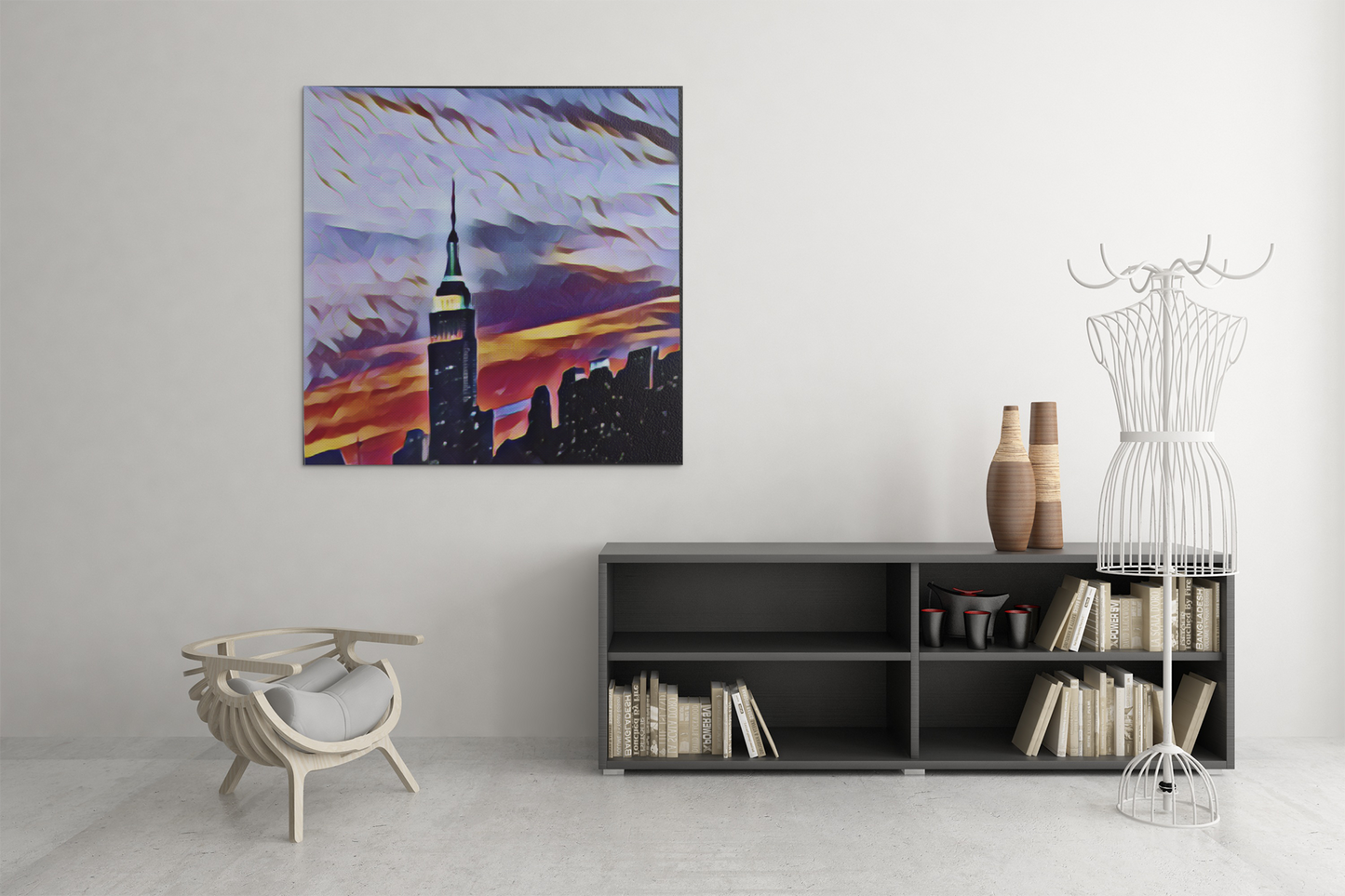 A mockup of stunning canvas print features a digitally enhanced photograph of the iconic Empire State Building and the skyline of New York City in a modern room with a chair and bureau.