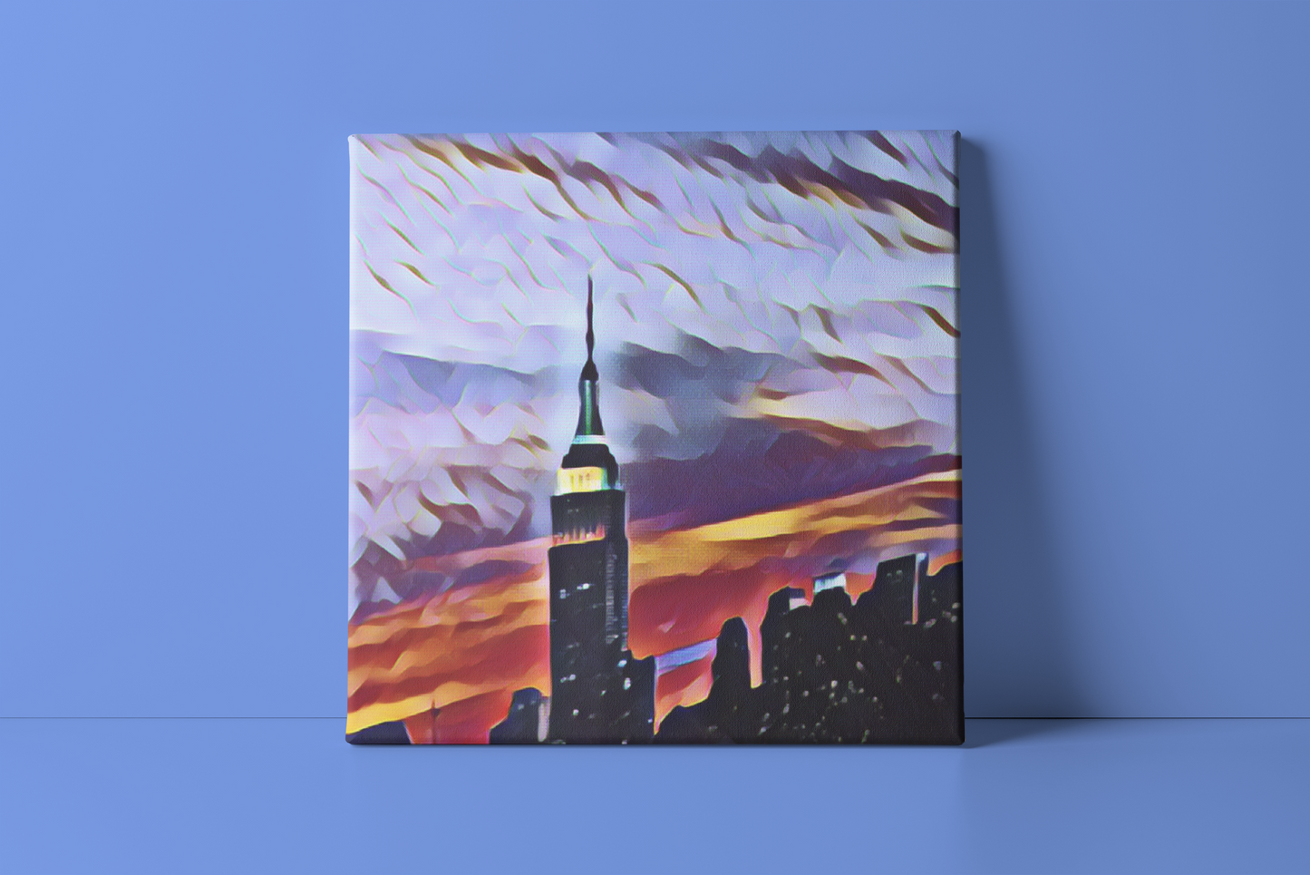 A mockup of stunning canvas print features a digitally enhanced photograph of the iconic Empire State Building and the skyline of New York City.